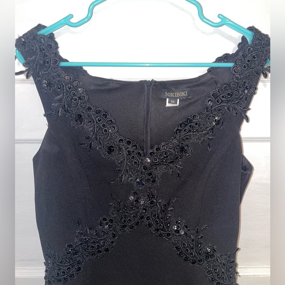 NIKIBIKI Off the Shoulder Black Mini Dress with Front Detailing - Picture 1 of 3